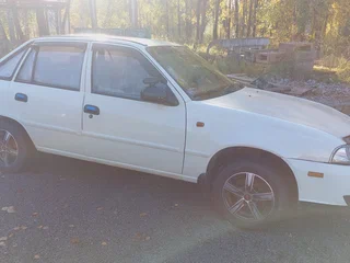 2012 Daewoo Nexia I Рестайлинг, бежевый, 230000 рублей, вид 1