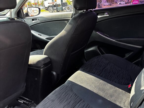 2014 Hyundai Solaris I Рестайлинг, оранжевый, 950000 рублей - вид 16
