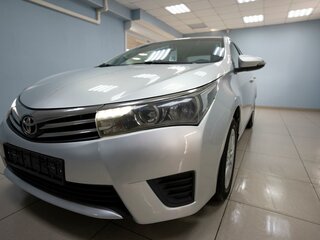 2013 Toyota Corolla XI (E160, E170, E180), серебристый, 1149000 рублей, вид 2