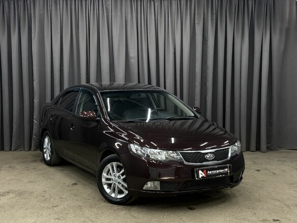 2011 Kia Cerato 6-speed II, красный - вид 1