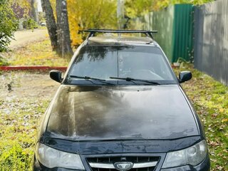 2011 Daewoo Nexia I Рестайлинг, чёрный, 100000 рублей, вид 1