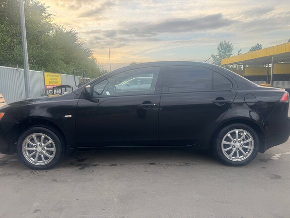 2012 Mitsubishi Lancer X Рестайлинг, чёрный, 830000 рублей - вид 9