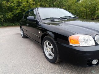 2004 Kia Magentis I Рестайлинг, чёрный, 440000 рублей, вид 2