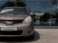 2010 Nissan Note I Рестайлинг, коричневый - вид 9