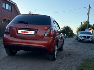 2009 Kia Rio II, оранжевый, 550000 рублей, вид 4