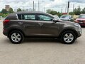 2011 Kia Sportage III, коричневый, 1235000 рублей - вид 4