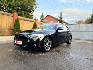 2011 BMW 1 серии 116i II (F20/F21), чёрный, 990000 рублей, вид 1
