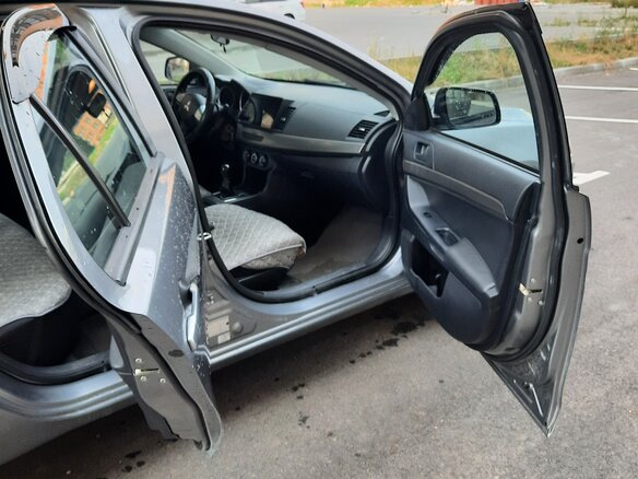 2012 Mitsubishi Lancer X Рестайлинг, серый - вид 9