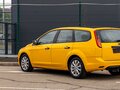 2011 Ford Focus II Рестайлинг, жёлтый - вид 8