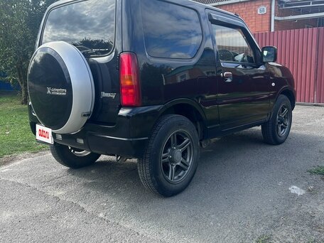 2012 Suzuki Jimny Kei car III Рестайлинг 2, чёрный, 910000 рублей, вид 4