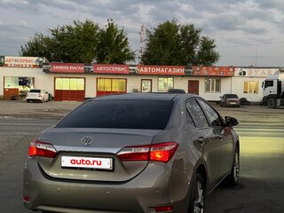 2013 Toyota Corolla XI (E160, E170, E180), коричневый, 1150000 рублей, вид 4