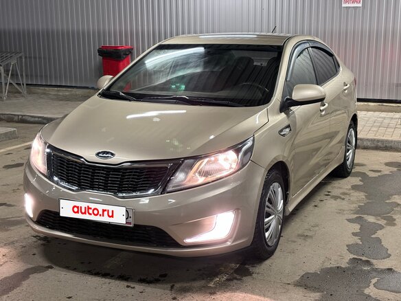 2011 Kia Rio 5-speed III, бежевый, 465000 рублей - вид 6