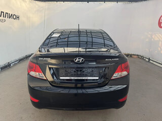 2012 Hyundai Solaris I, чёрный, 573550 рублей, вид 4