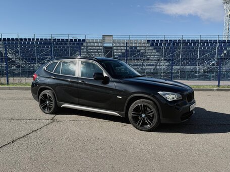 2012 BMW X1 20d I (E84), чёрный, вид 1