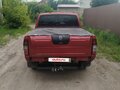 2009 Nissan NP300, красный, 1380000 рублей - вид 4