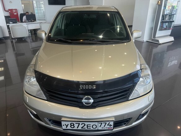 2010 Nissan Tiida I Рестайлинг, серебристый - вид 1