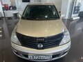 2010 Nissan Tiida I Рестайлинг, серебристый - вид 1