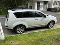 2011 Mitsubishi Outlander II Рестайлинг, белый, 1200000 рублей - вид 4