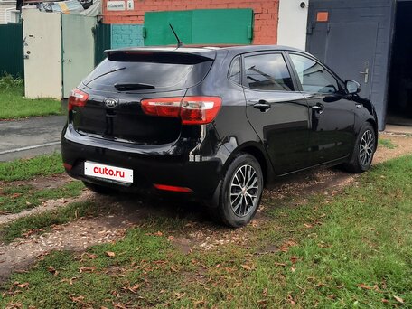 2013 Kia Rio III, чёрный, 899900 рублей, вид 3