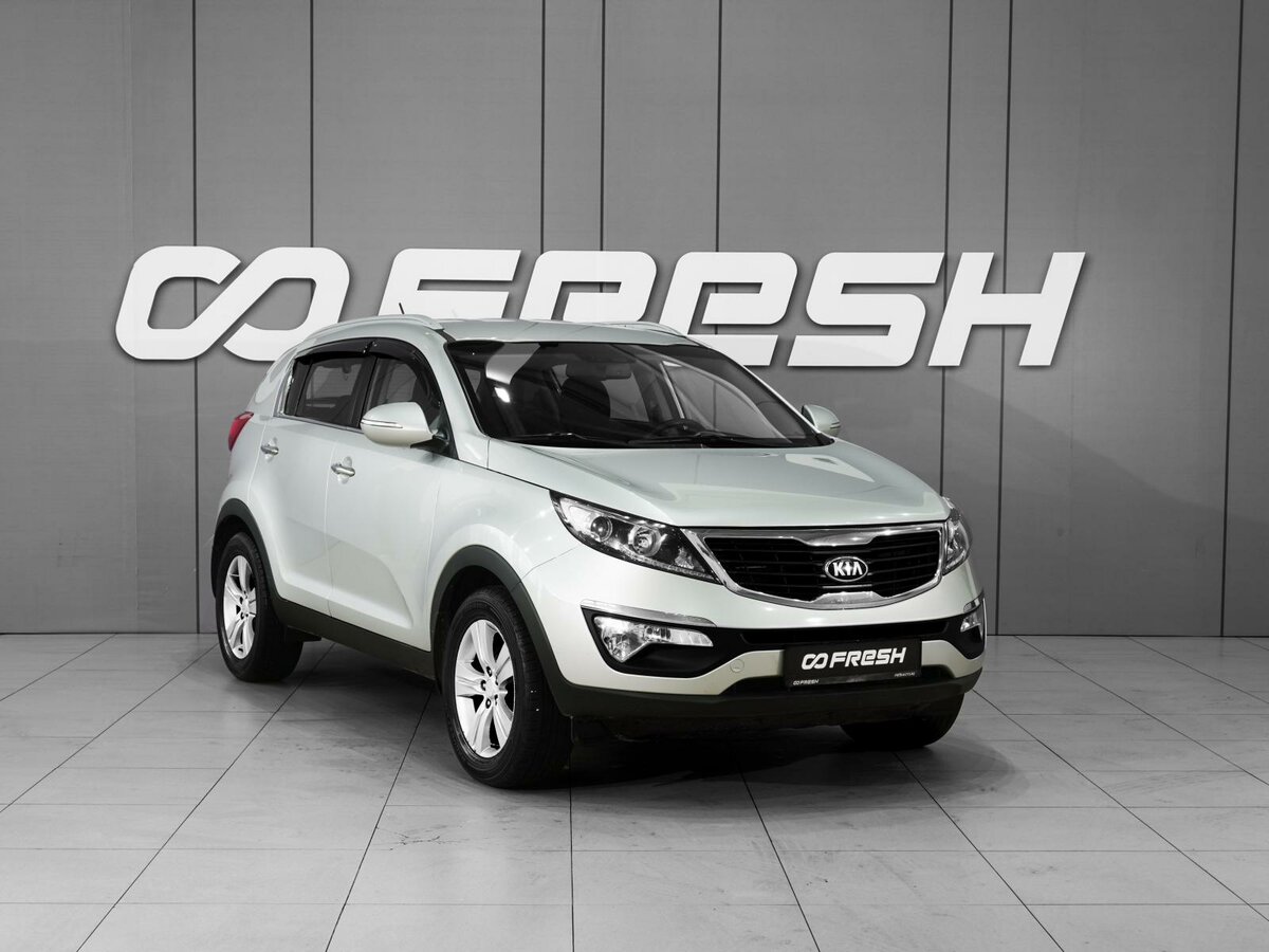 Открыть фотографии: Kia Sportage III