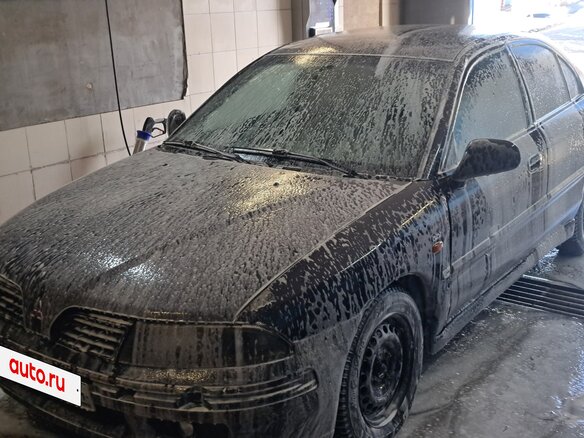 1998 Mitsubishi Carisma I, синий, 350000 рублей - вид 2