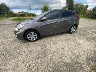 2012 Hyundai Solaris I, чёрный, 700000 рублей, вид 4