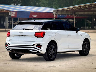 2022 Audi Q2 L 35 TFSI I Рестайлинг, белый, 1550077 рублей, вид 4