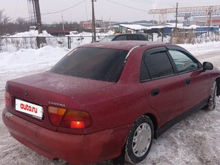 1997 Mitsubishi Carisma I, пурпурный, 180000 рублей, вид 3