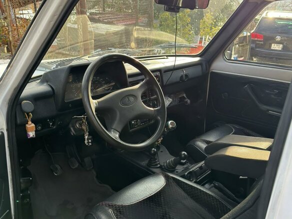 2009 Lada (ВАЗ) 2121 (4x4) I Рестайлинг, белый, 290000 рублей - вид 11