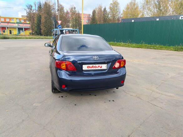 2009 Toyota Corolla X (E140, E150), синий, 650000 рублей - вид 3