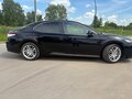 2020 Toyota Camry VIII (XV70), чёрный, 3050000 рублей - вид 2