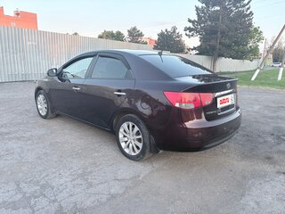2011 Kia Cerato 6-speed II, пурпурный, 980000 рублей, вид 4
