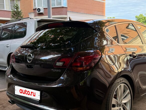 2014 Opel Astra J Рестайлинг, коричневый, 1360000 рублей - вид 9