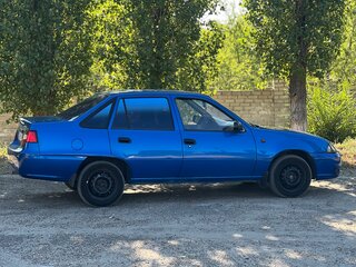 2012 Daewoo Nexia I Рестайлинг, синий, 255000 рублей, вид 2