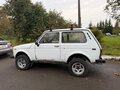 2001 Lada (ВАЗ) 2121 (4x4) I Рестайлинг, белый - вид 3