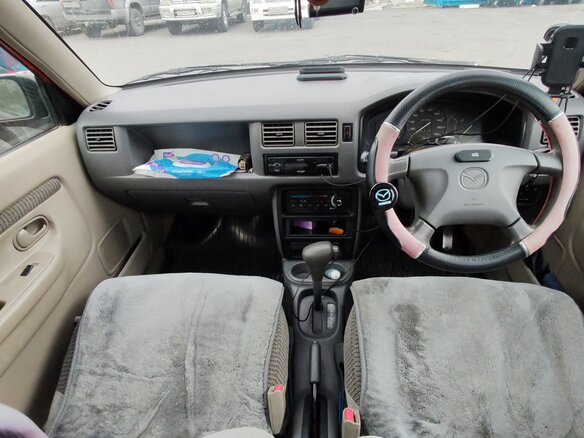 1999 Mazda Demio I (DW), красный, 200000 рублей - вид 7