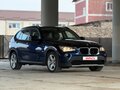 2011 BMW X1 18i I (E84), синий, 1259000 рублей - вид 2