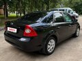2010 Ford Focus II Рестайлинг, чёрный - вид 5