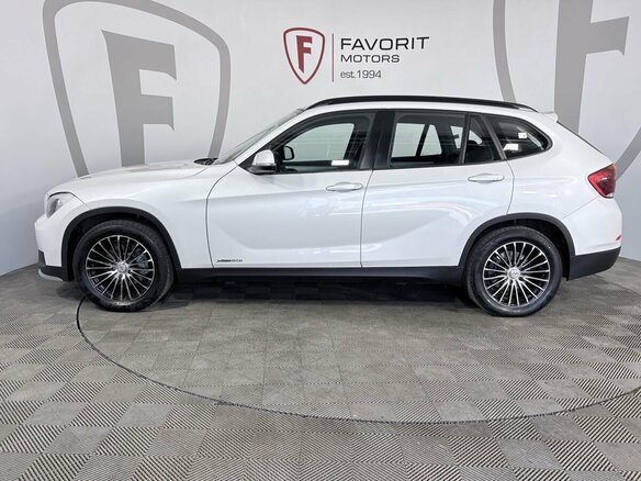 2014 BMW X1 20i I (E84) Рестайлинг, белый - вид 4
