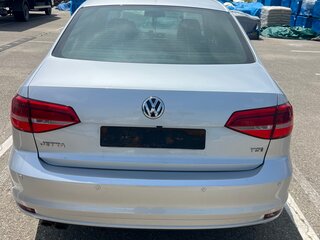 2015 Volkswagen Jetta VI Рестайлинг, серебристый, 1200000 рублей, вид 4