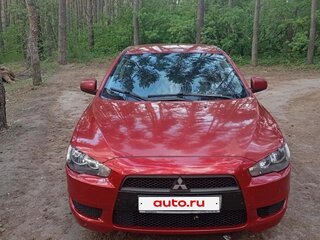 2009 Mitsubishi Lancer X, красный, 650000 рублей, вид 3