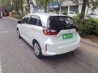 2023 Honda Fit Crosstar IV Рестайлинг, белый, 1017777 рублей, вид 4