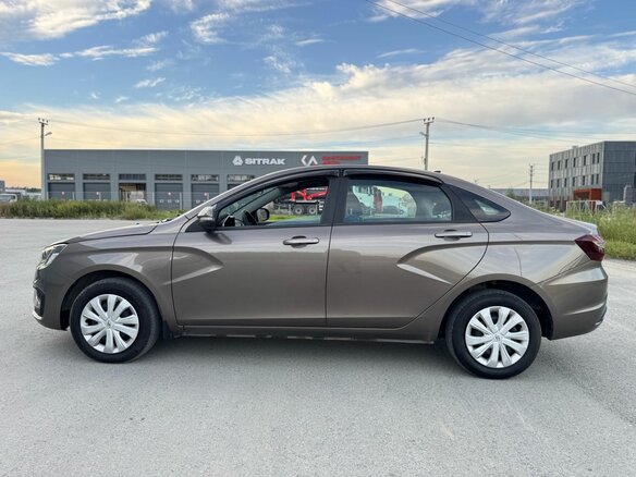 2024 Lada (ВАЗ) Vesta I Рестайлинг (NG), коричневый, 1269000 рублей - вид 8