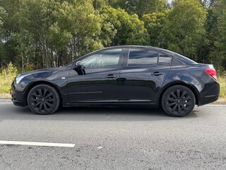 2011 Chevrolet Cruze I, чёрный, 595000 рублей, вид 5