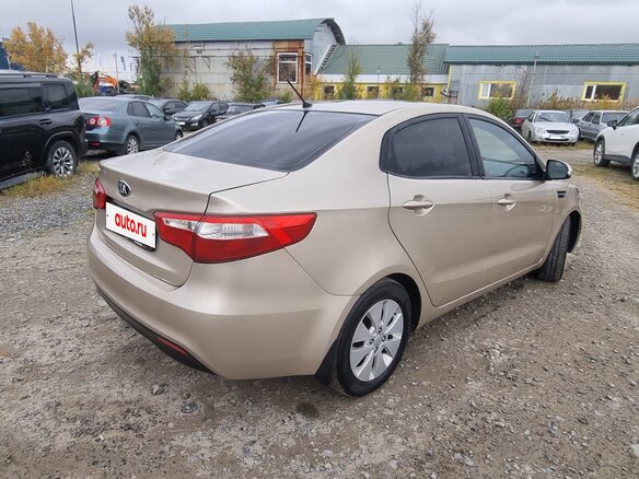 2013 Kia Rio 5-speed III, бежевый, 520000 рублей - вид 6
