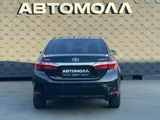 2013 Toyota Corolla XI (E160, E170, E180), чёрный, 1250000 рублей, вид 4