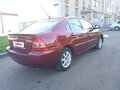 2006 Toyota Corolla IX (E120, E130) Рестайлинг, красный, 587000 рублей - вид 4