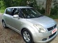 2007 Suzuki Swift III, серебристый - вид 1