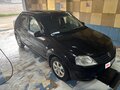 2010 Renault Logan I Рестайлинг, чёрный, 560000 рублей - вид 2