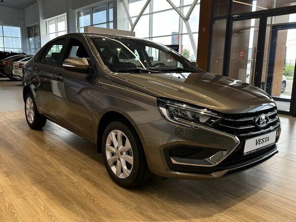 2026 Lada (ВАЗ) Vesta I Рестайлинг (NG), коричневый, 1875000 рублей - вид 2